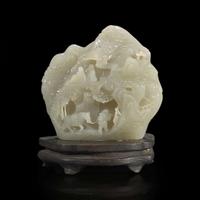 A small Chinese carved celadon-grey jade "mountain" 青灰玉山子 20th century ????