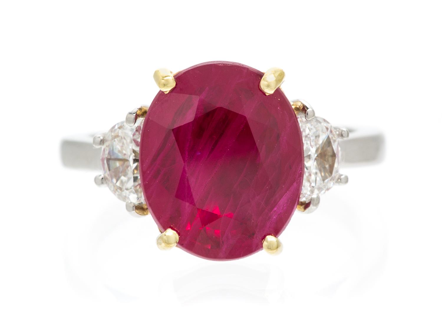 A Platinum, Yellow Gold, Ruby and Diamond Ring, 4.70 dwts.