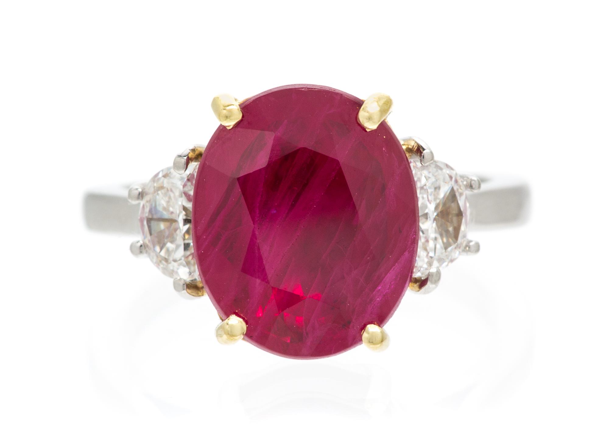 A Platinum, Yellow Gold, Ruby and Diamond Ring, 4.70 dwts.