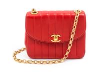 A Chanel Rouge Quilted Leather Flap Bag, 7 x 5 1/2 x 2 3/4 inches.