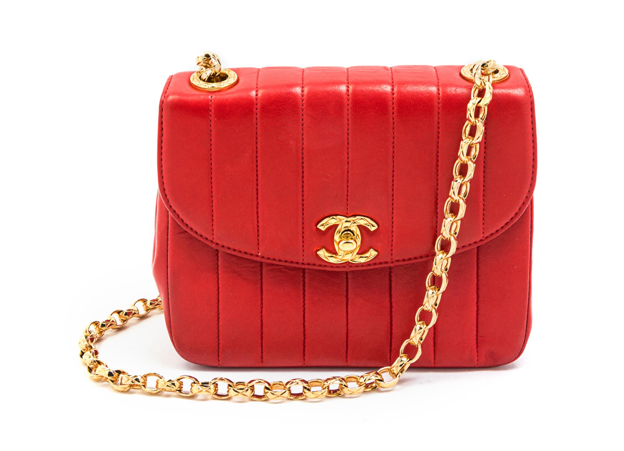 A Chanel Rouge Quilted Leather Flap Bag, 7 x 5 1/2 x 2 3/4 inches.