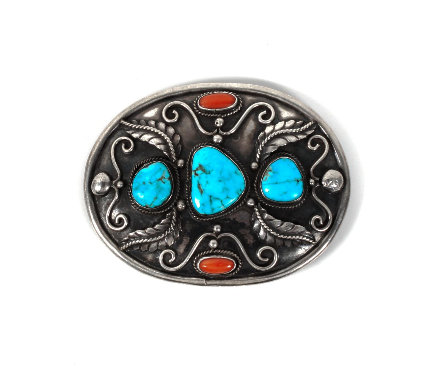 A Silver, Turquoise and Coral Belt Buckle Height 3 x width 3 3/4 inches.