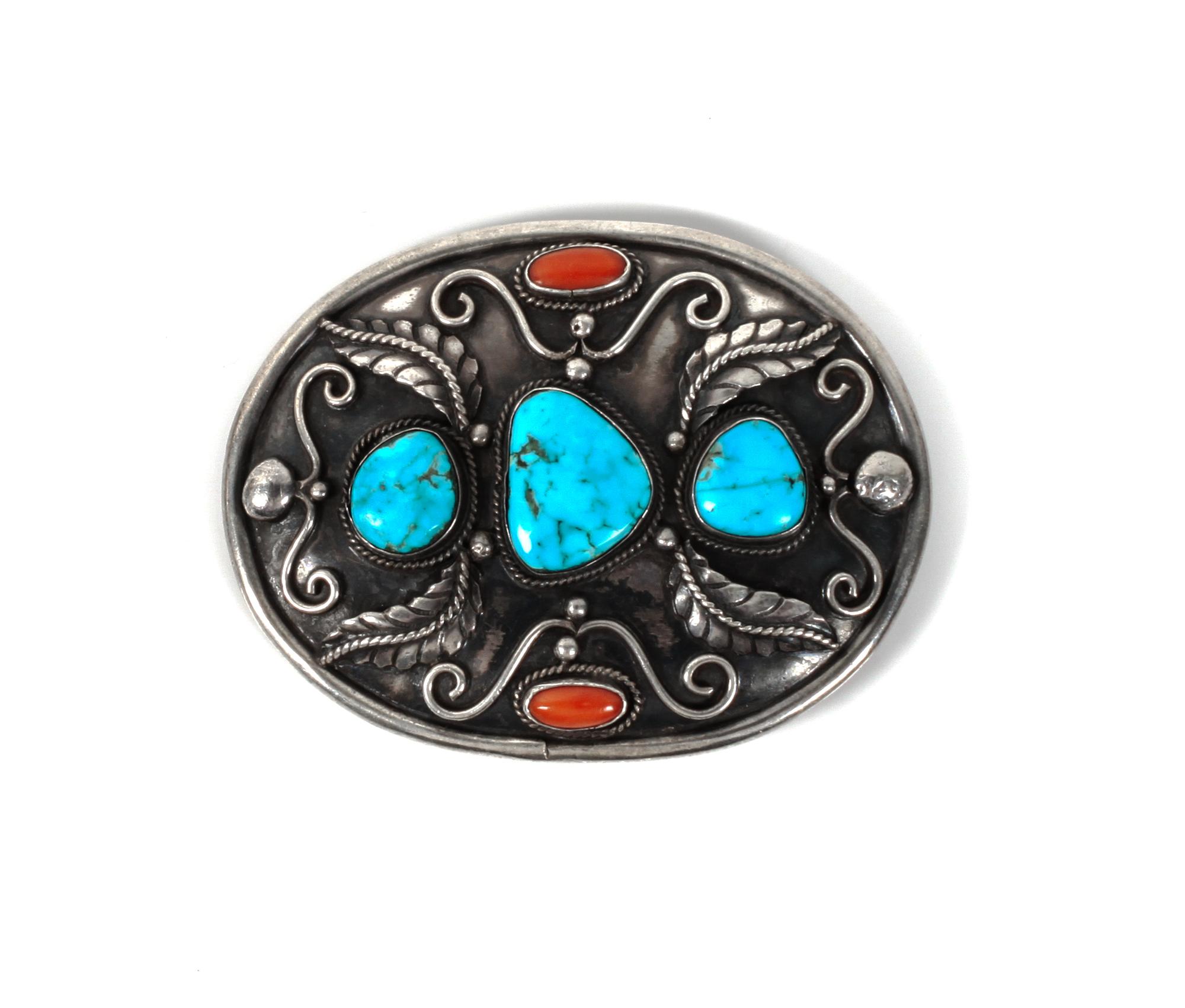 A Silver, Turquoise and Coral Belt Buckle Height 3 x width 3 3/4 inches.