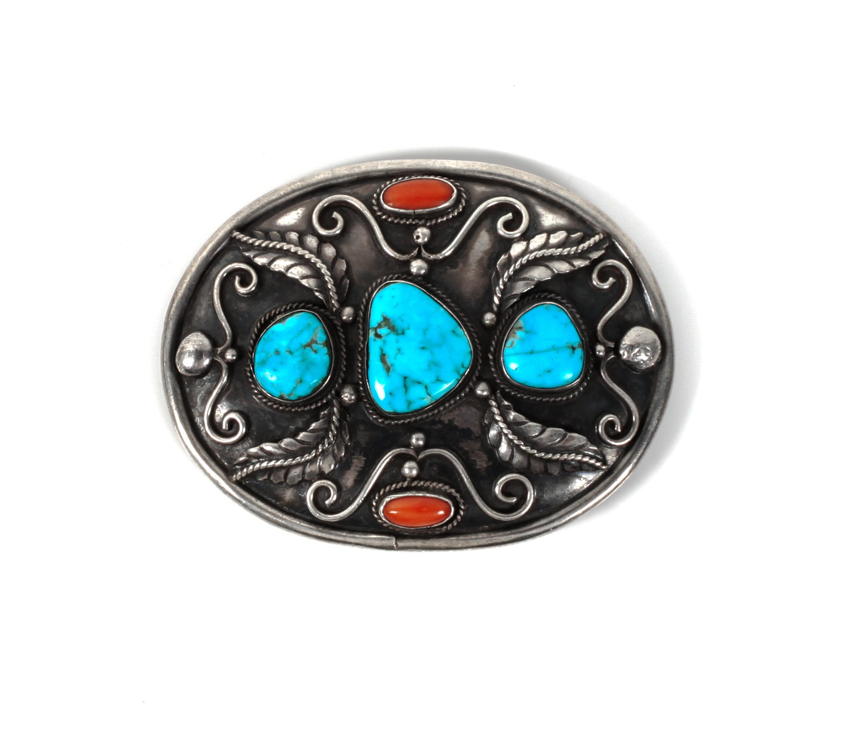 A Silver, Turquoise and Coral Belt Buckle Height 3 x width 3 3/4 inches.