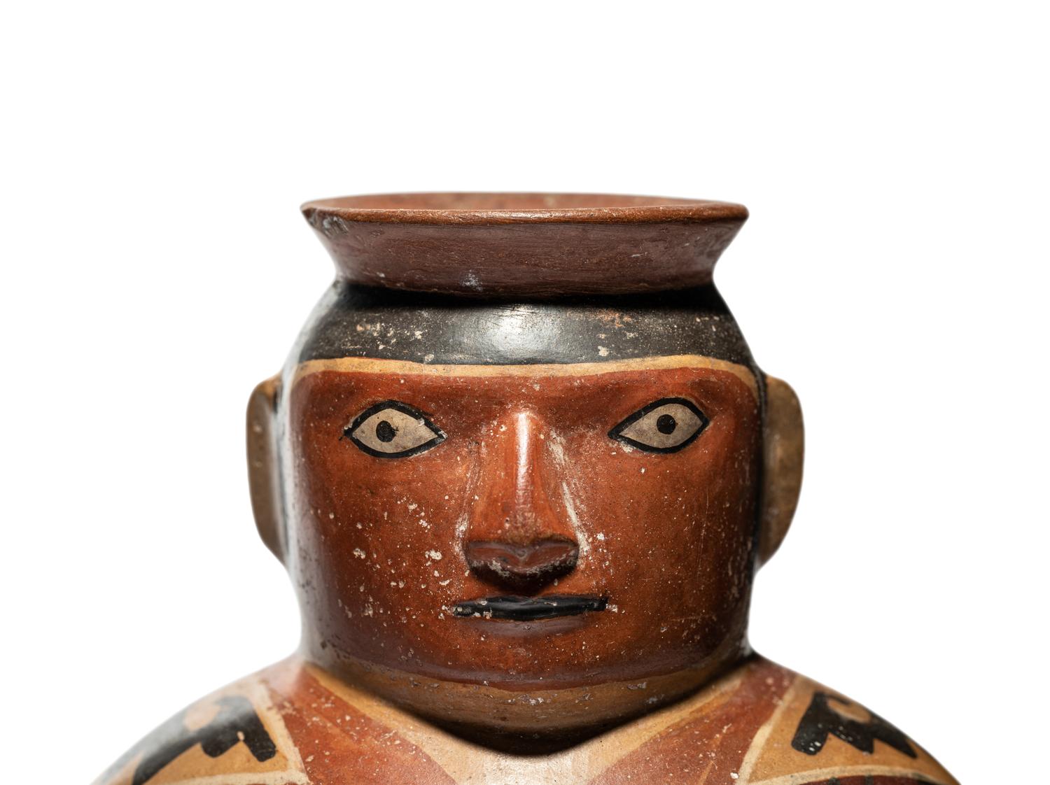 A Huari Man with Poncho Vessel
