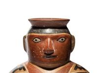 A Huari Man with Poncho Vessel