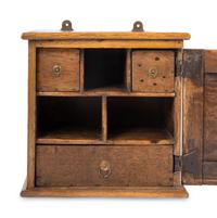 A Charles II Oak Spice Cabinet