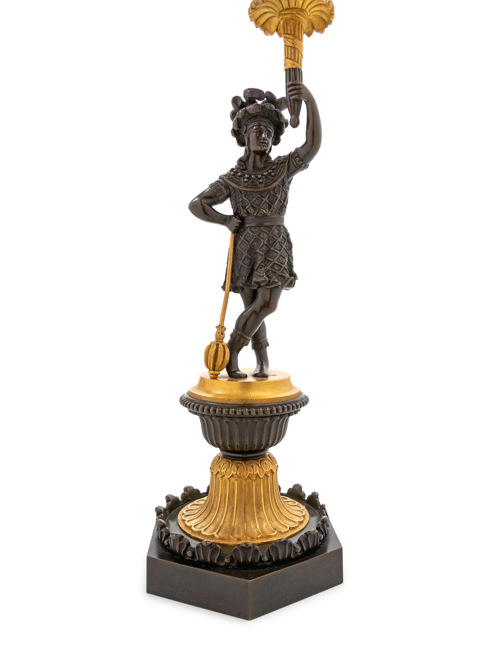 A Pair of Regency Gilt and Patinated Bronze Three-Light Figural Candelabra