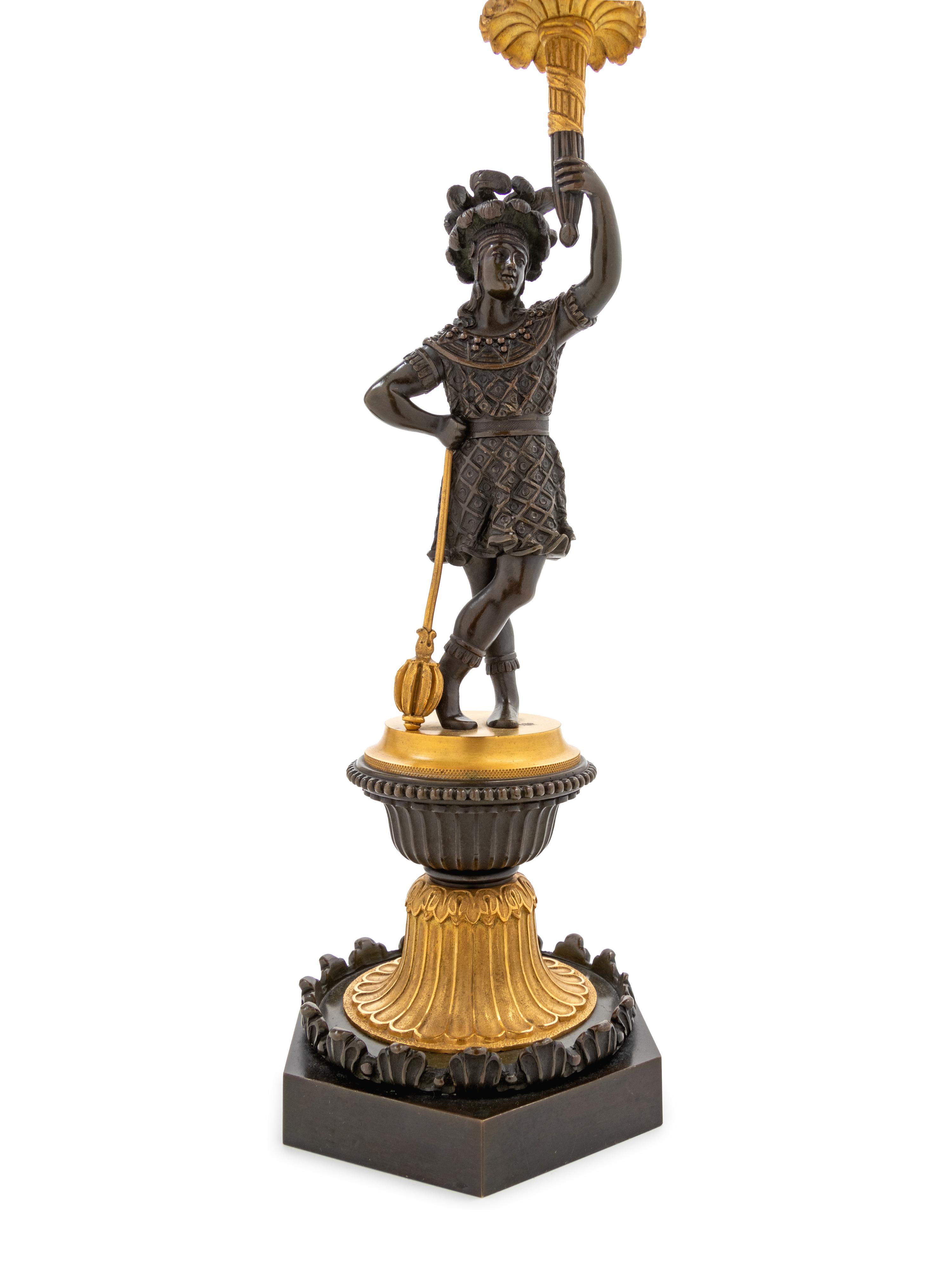 A Pair of Regency Gilt and Patinated Bronze Three-Light Figural Candelabra