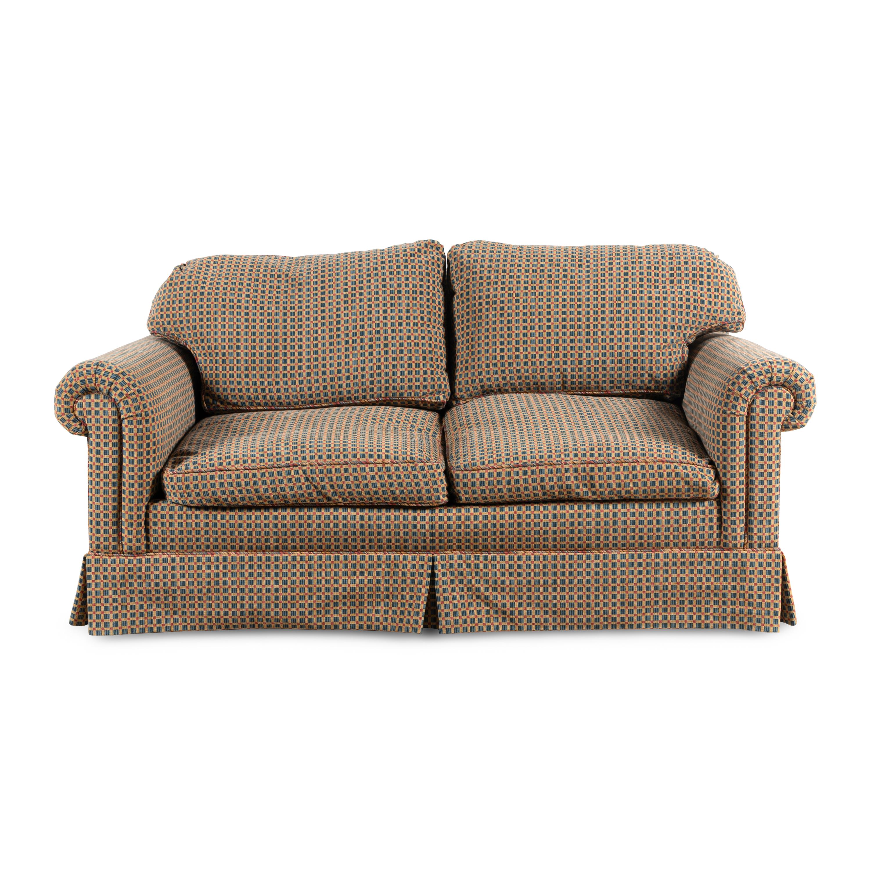 An Edward Ferrell Upholstered Loveseat