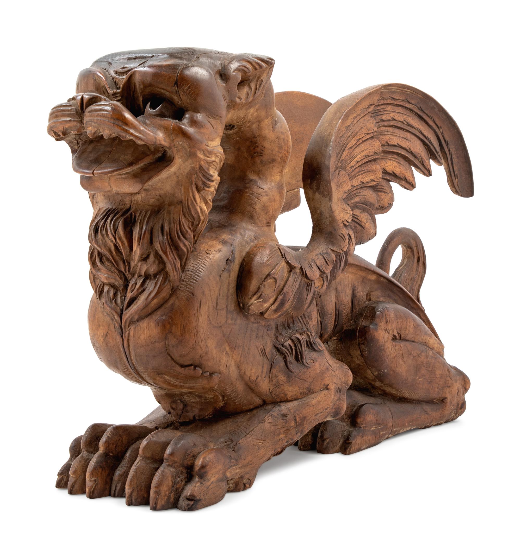 A Continental Carved Griffin