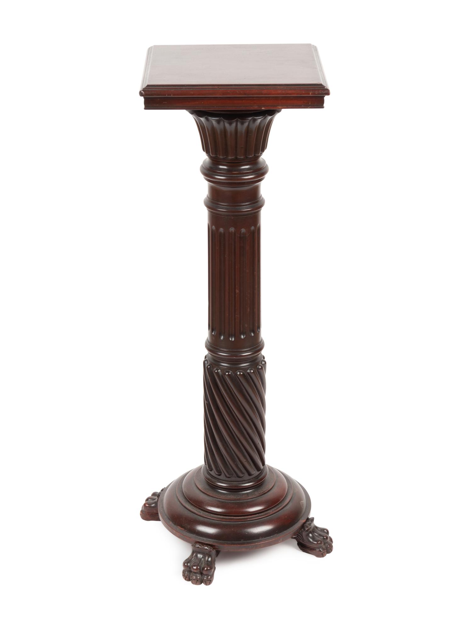 A Carved Mahogany Pedestal