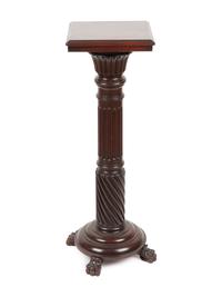 A Carved Mahogany Pedestal