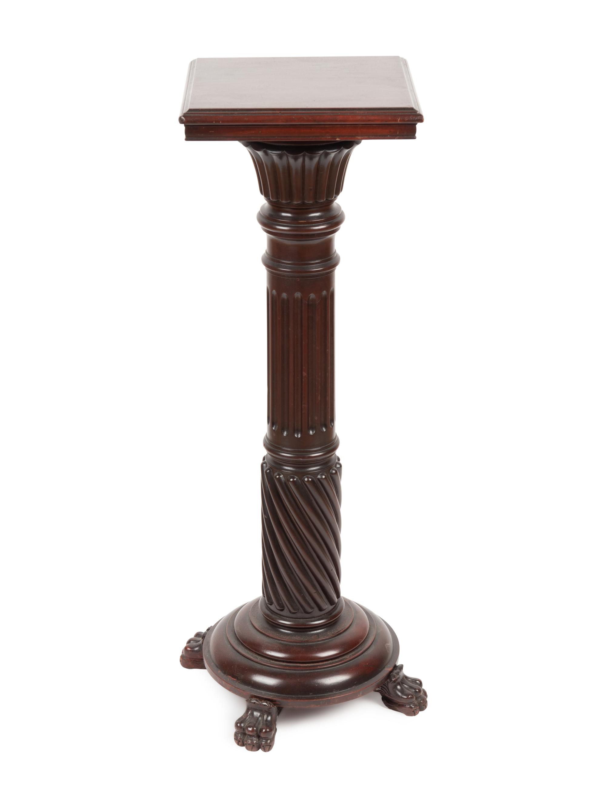 A Carved Mahogany Pedestal