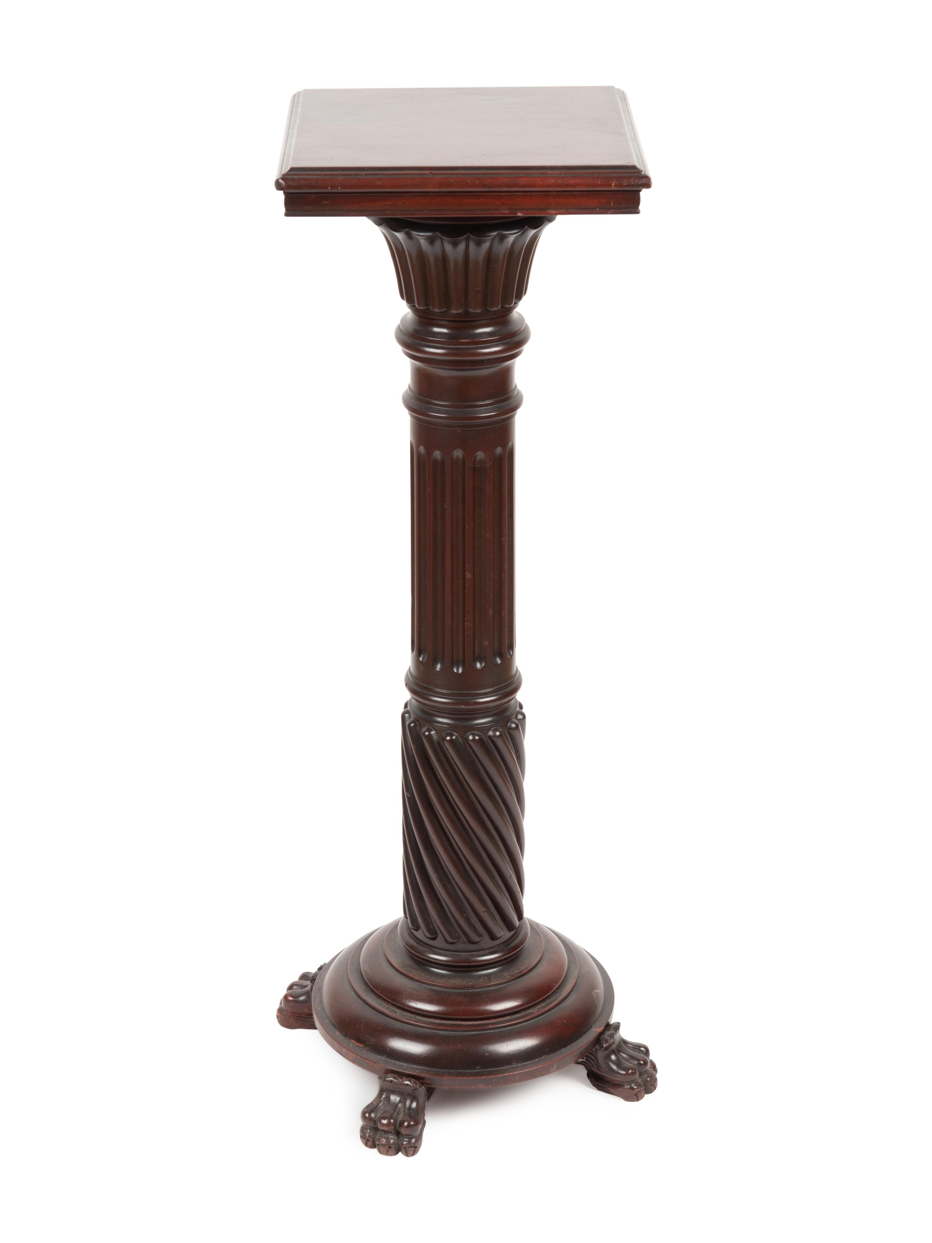 A Carved Mahogany Pedestal