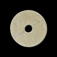 A Chinese greyish white jade archaistic bi disk 灰白玉璧
