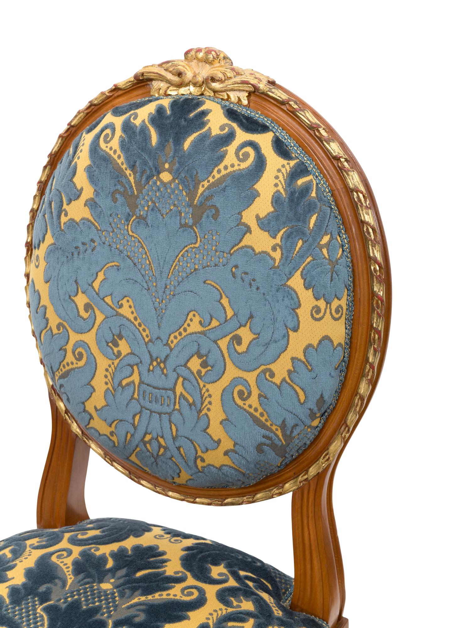 A Set of Three Italian Parcel Gilt Side Chairs