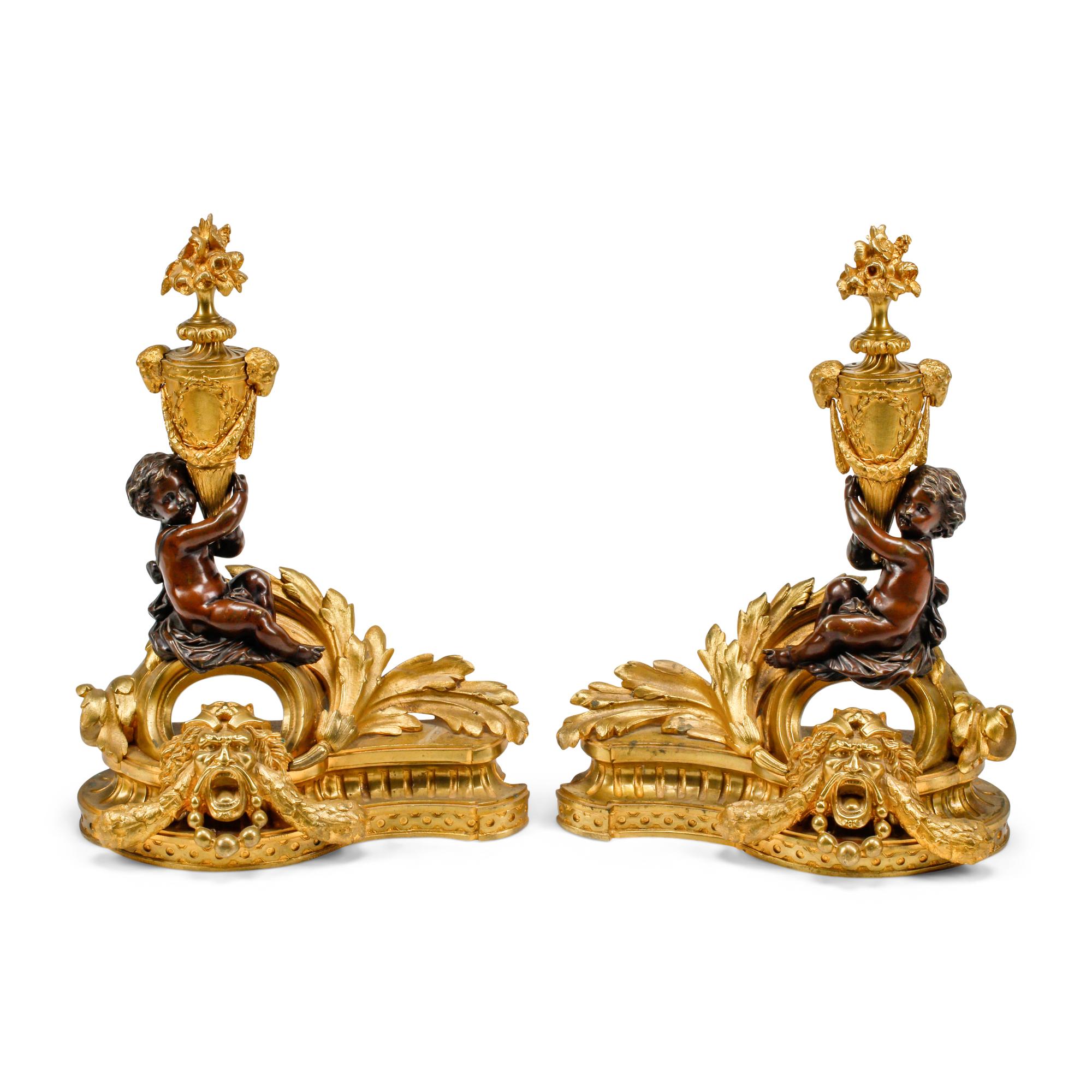 A Pair of Louis XV Style Gilt and Patinated Bronze Figural Chenets