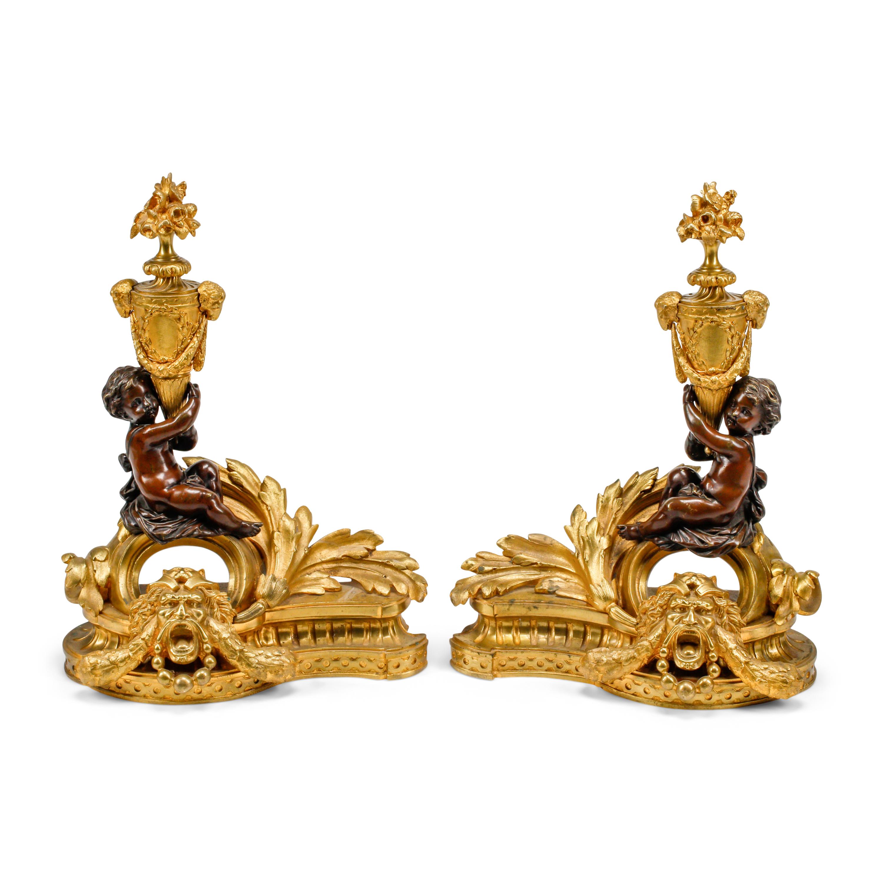 A Pair of Louis XV Style Gilt and Patinated Bronze Figural Chenets