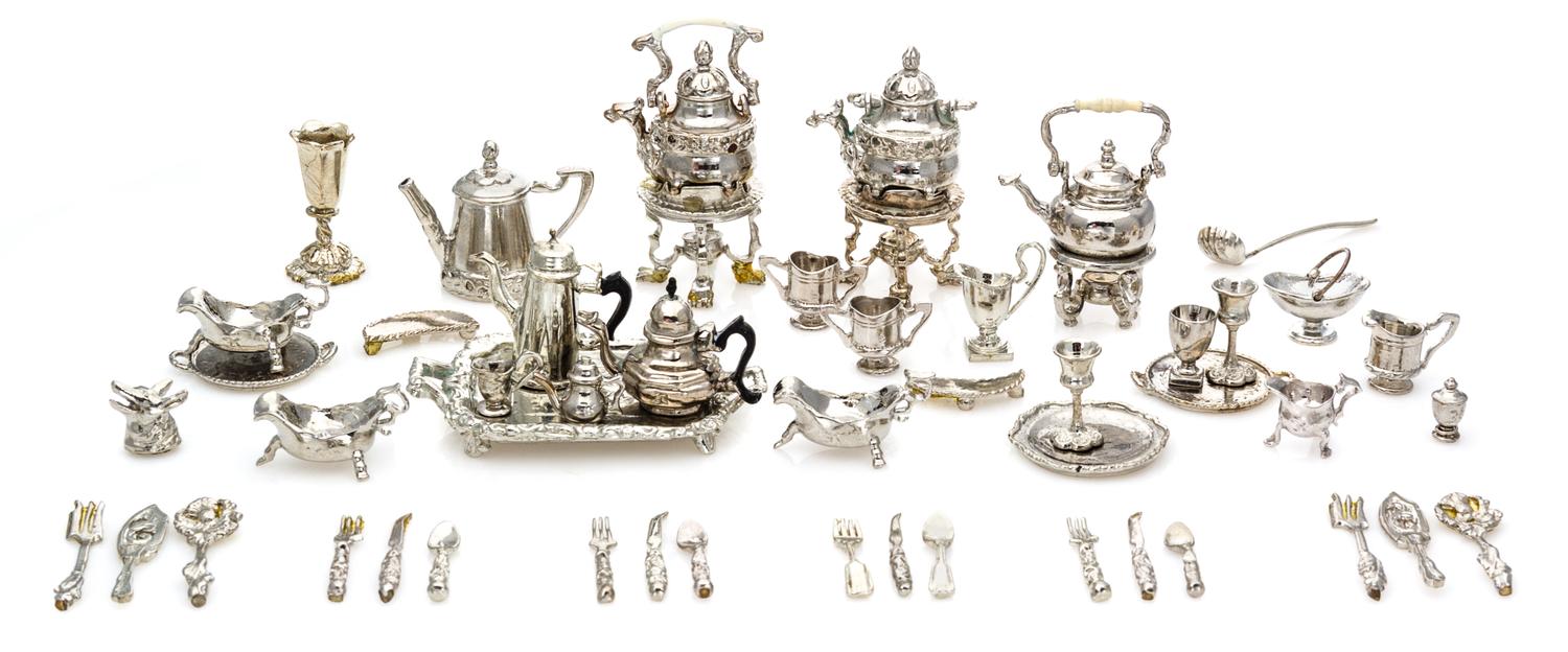 A Group of Silver and Silvered Bronze Table Articles Width of widest 1 3/4 inches. — Eugene Kupjack