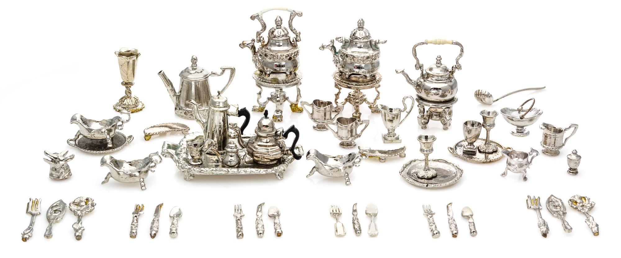 A Group of Silver and Silvered Bronze Table Articles Width of widest 1 3/4 inches. — Eugene Kupjack