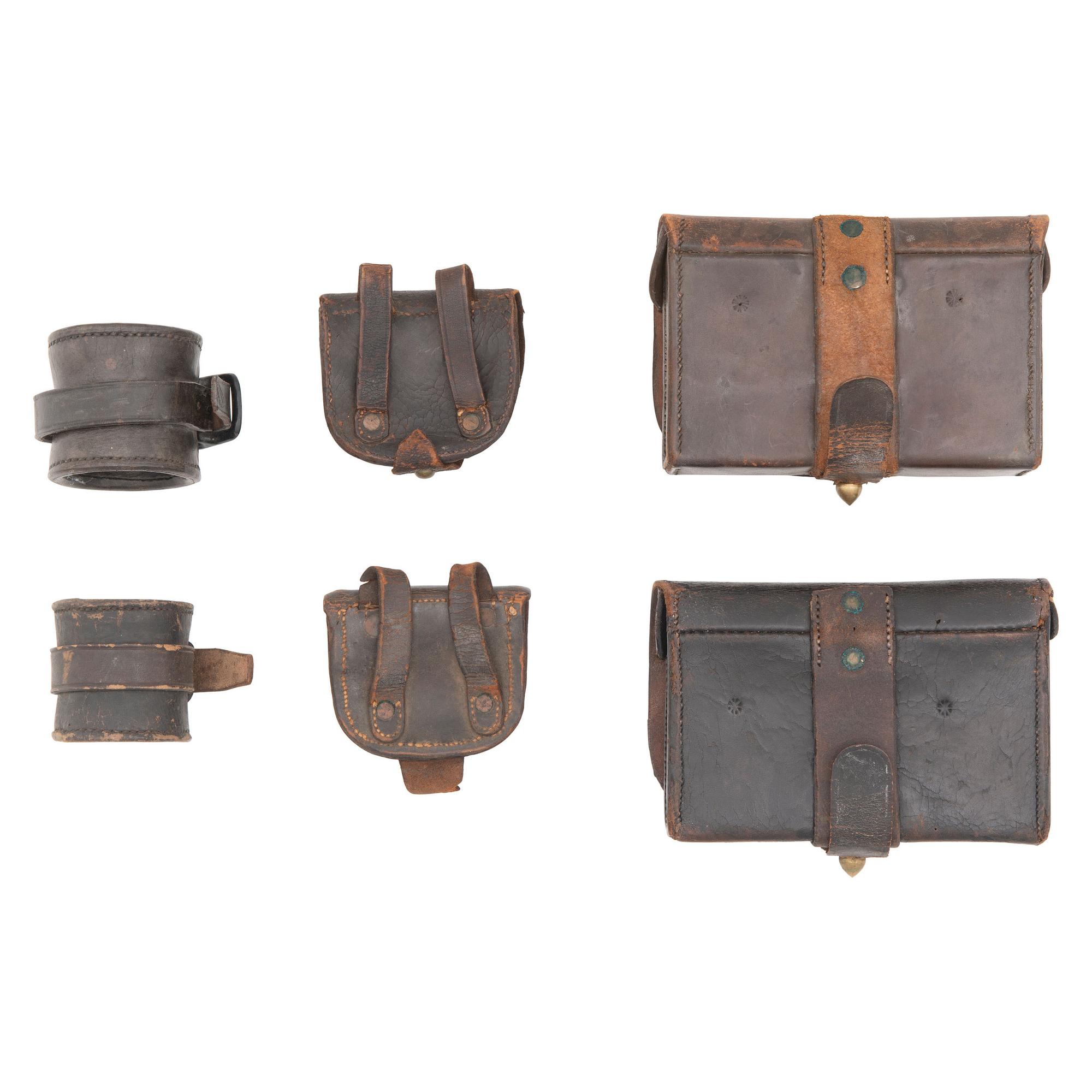 Group of Civil War Era Accoutrements: 2 Mann's Patent Cartridge Boxes, 2 Cap Pouches and 2 Carbine Socekts