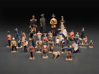 A Collection of Folk Art Carved and Painted 'English Parade' Figures