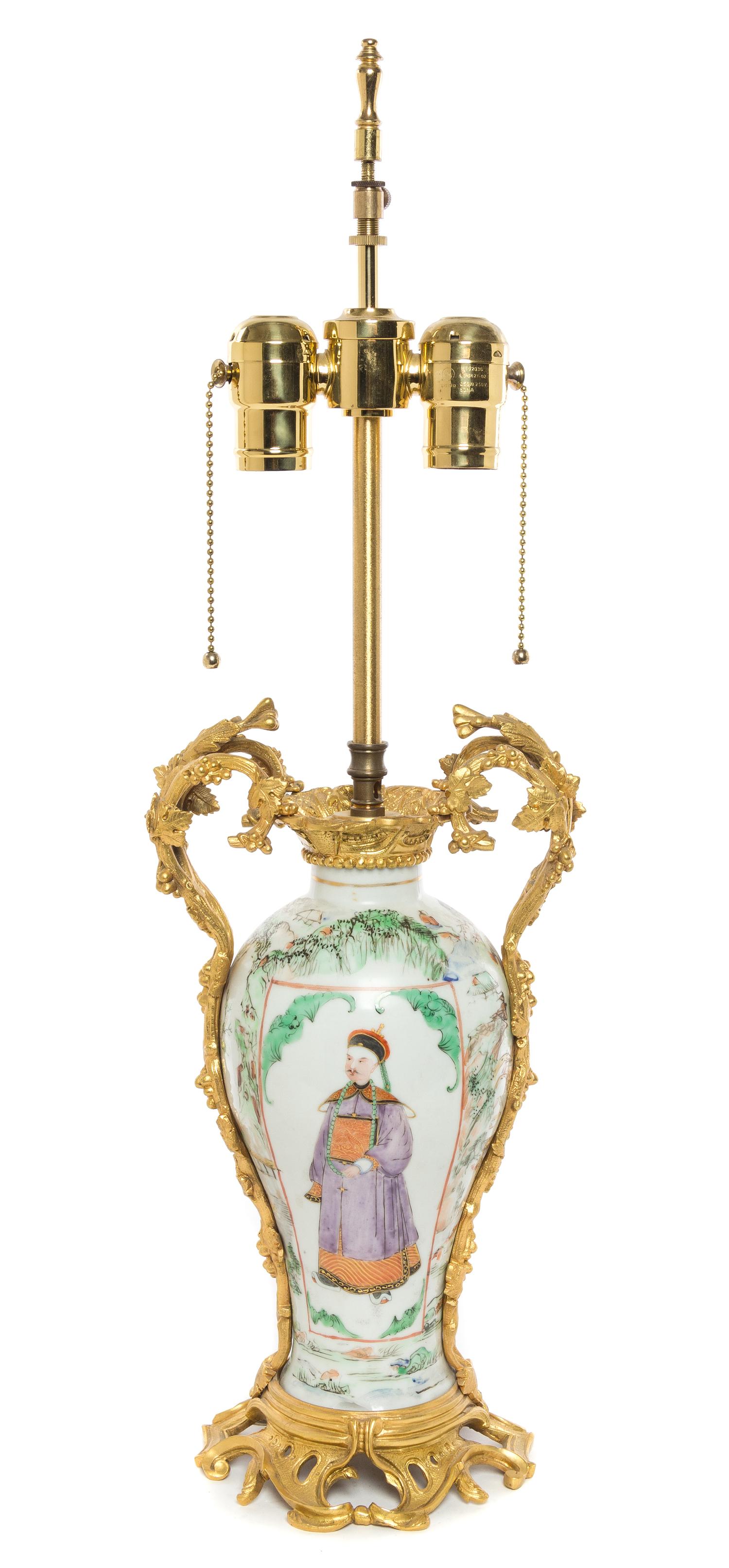 A Chinese Gilt Bronze Mounted Porcelain Vase Height overall 24 inches.