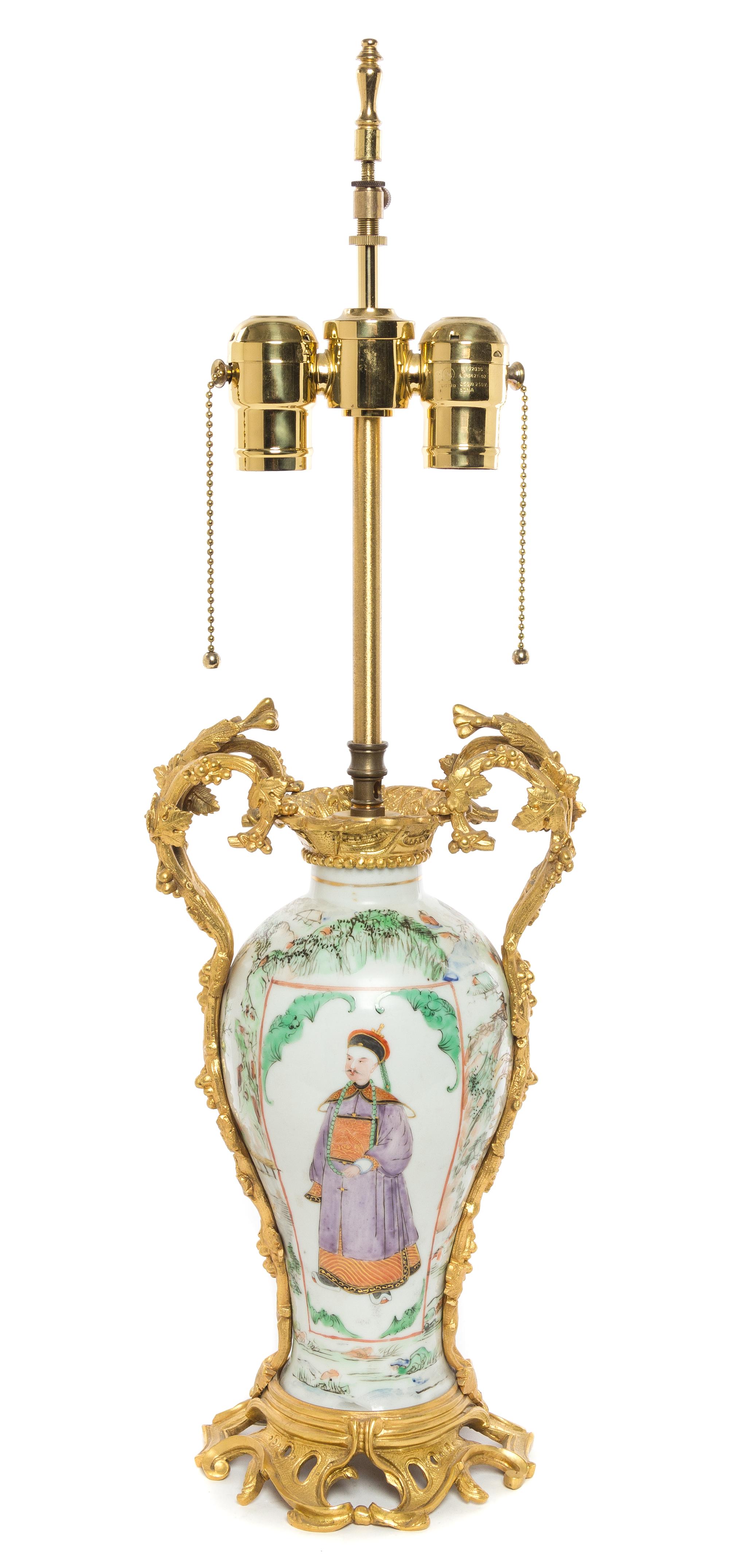A Chinese Gilt Bronze Mounted Porcelain Vase Height overall 24 inches.