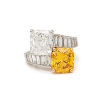 OSCAR HEYMAN, FANCY DEEP ORANGE-YELLOW DIAMOND AND DIAMOND RING