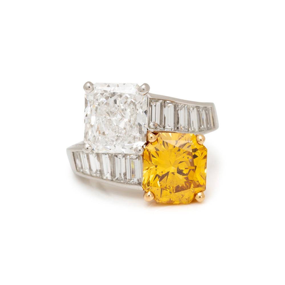 OSCAR HEYMAN, FANCY DEEP ORANGE-YELLOW DIAMOND AND DIAMOND RING