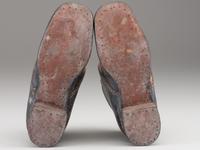 [CIVIL WAR]. A pair of military-issue brogans with a pair of Civil War-period socks.