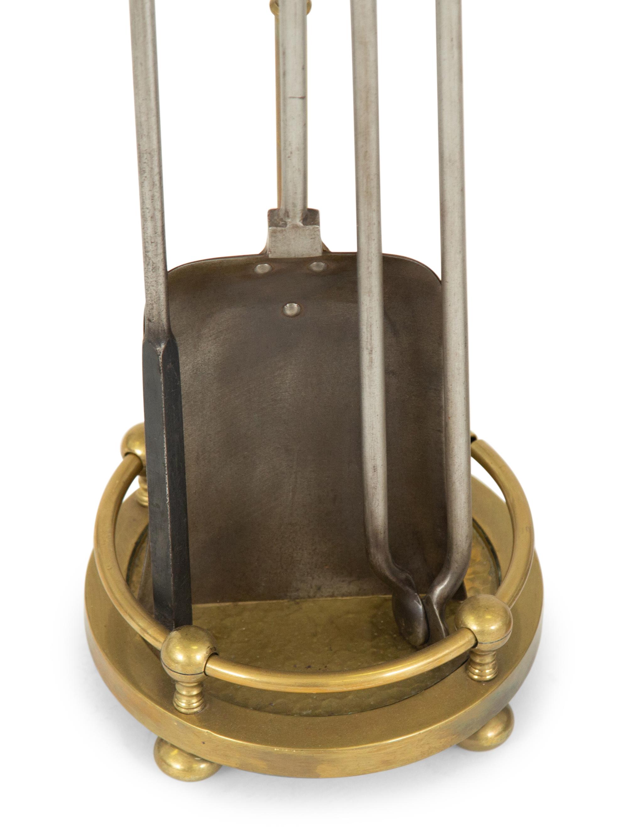 Two Sets of Brass Fire Tools and a Pair of Brass Andirons