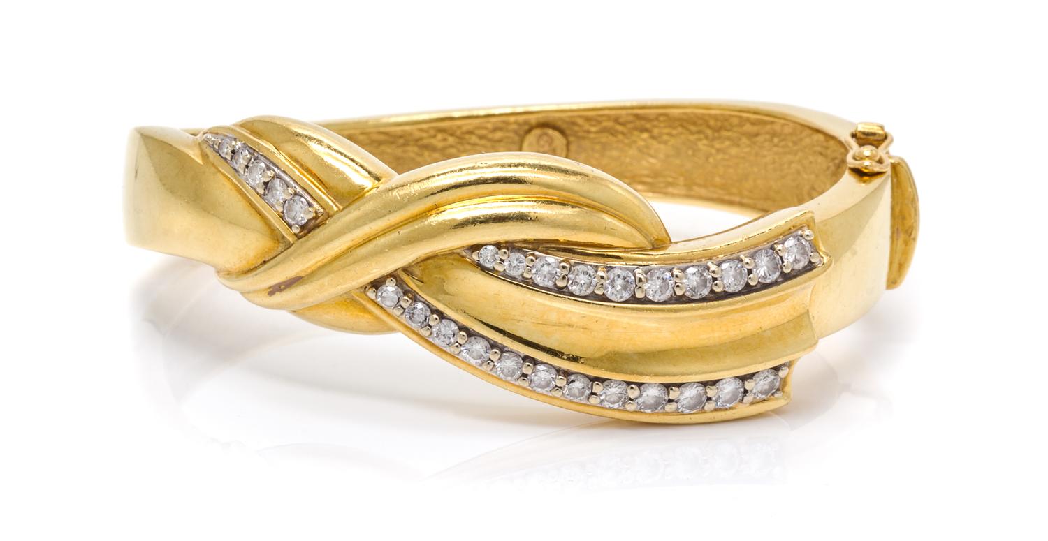 An 18 Karat Yellow Gold and Diamond Bangle Bracelet, 36.60 dwts.