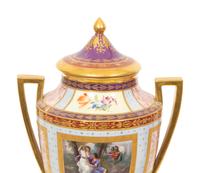 A Pair of Vienna Porcelain Urns and Covers