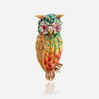 A gold, enamel, and gem-set brooch