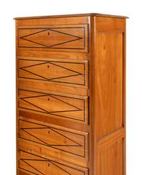 A Pair of French Fruitwood and Parcel-Ebonized Semaniers