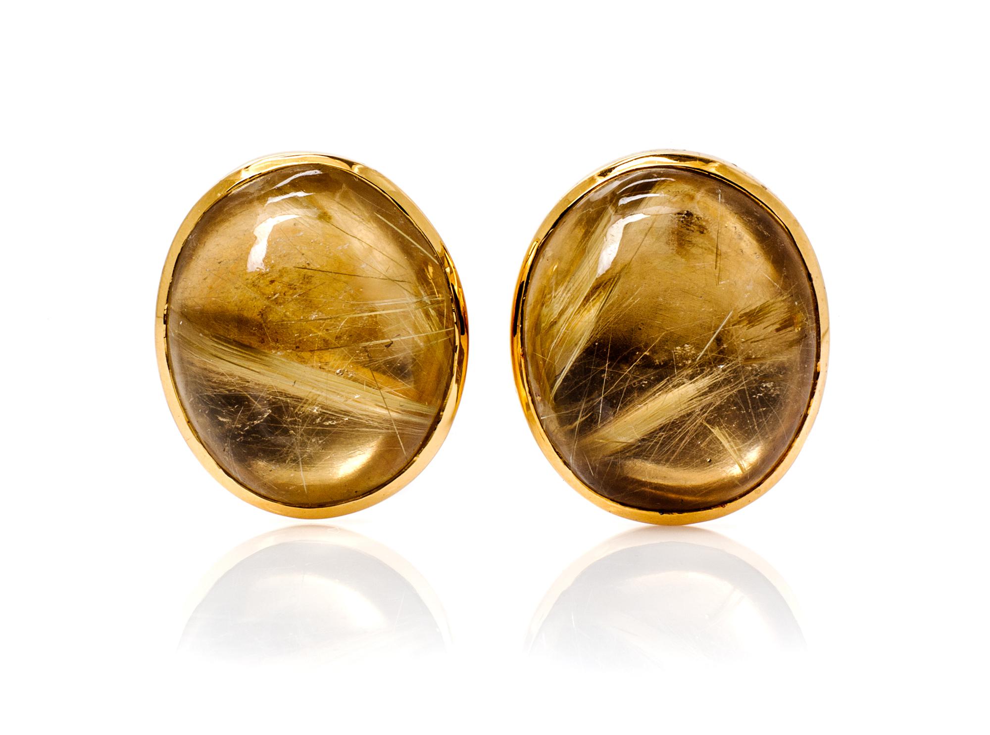 A Pair of 18 Karat Yellow Gold and Rutilated Quartz Earclips, 17.90 dwts.