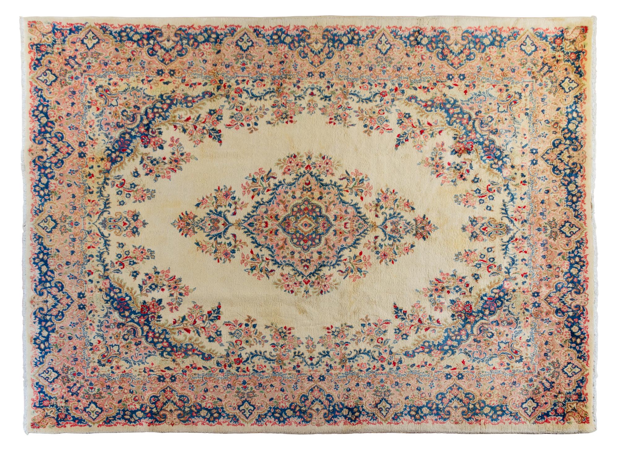 A Kirman Wool Rug 11 feet 9 inches x 8 feet 6 inches. — 20TH CENTURY