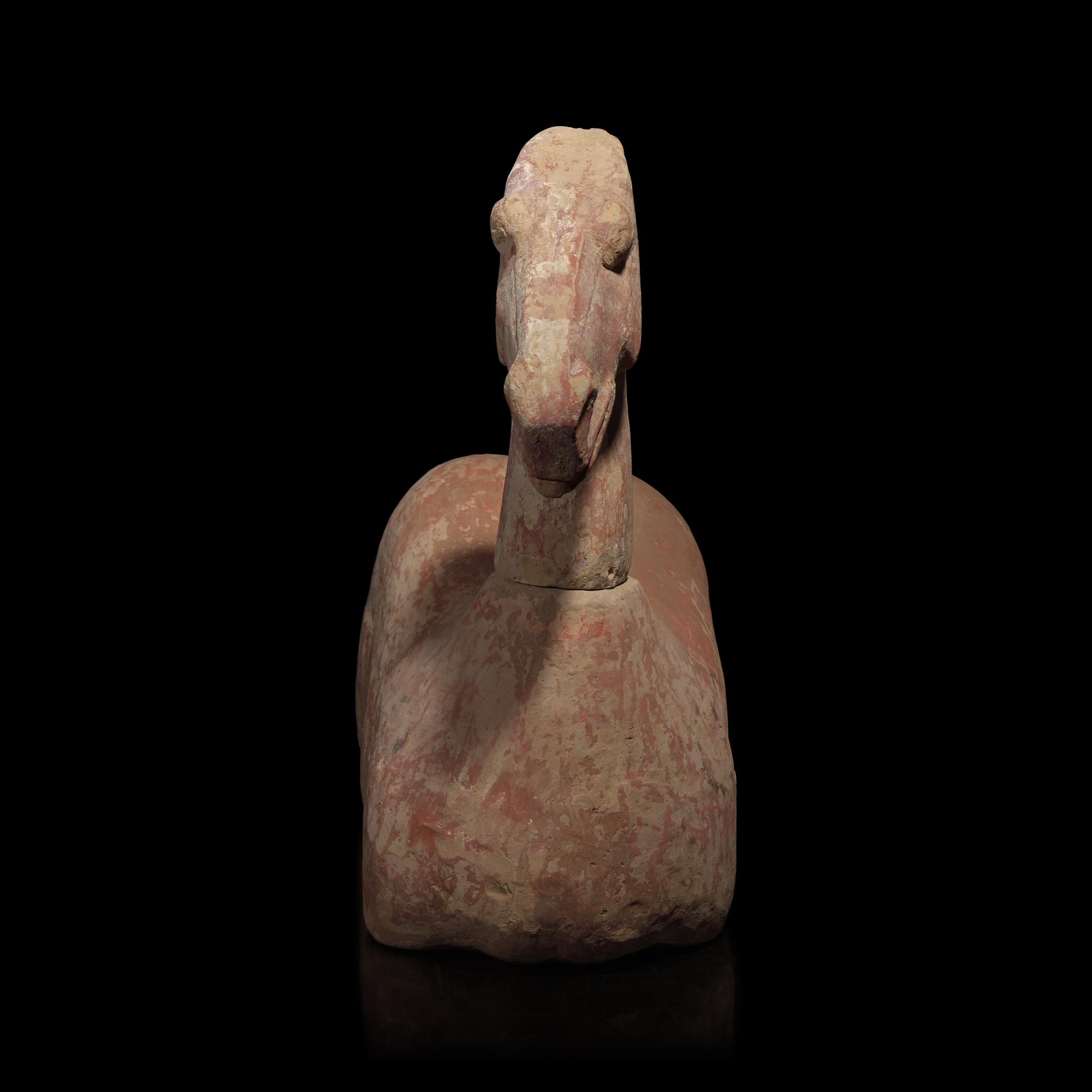 A Chinese Pottery Figure of a Recumbent Horse, Han Dynasty — 漢 彩繪灰陶馬