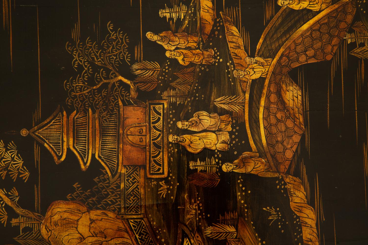 A Chinese Black and Gilt Chinoiserie Decorated Low Table