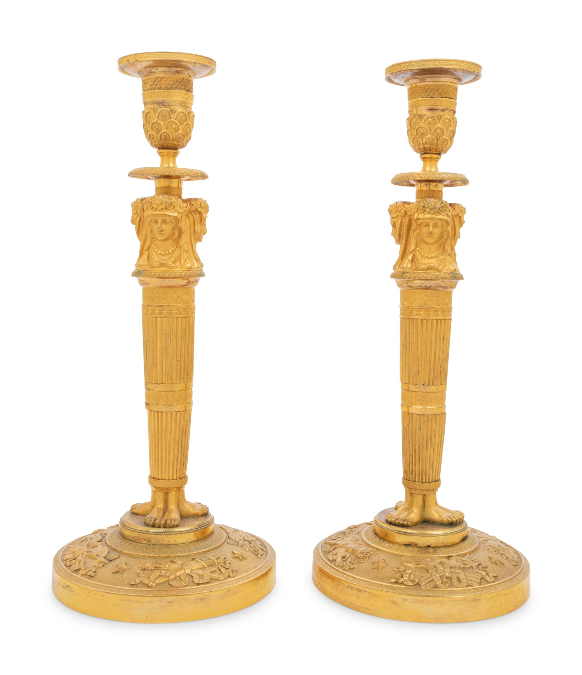 A Pair of Empire Gilt Bronze Candlesticks