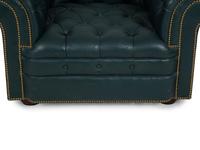 A Chesterfield Style Button-Tufted Leather Armchair
