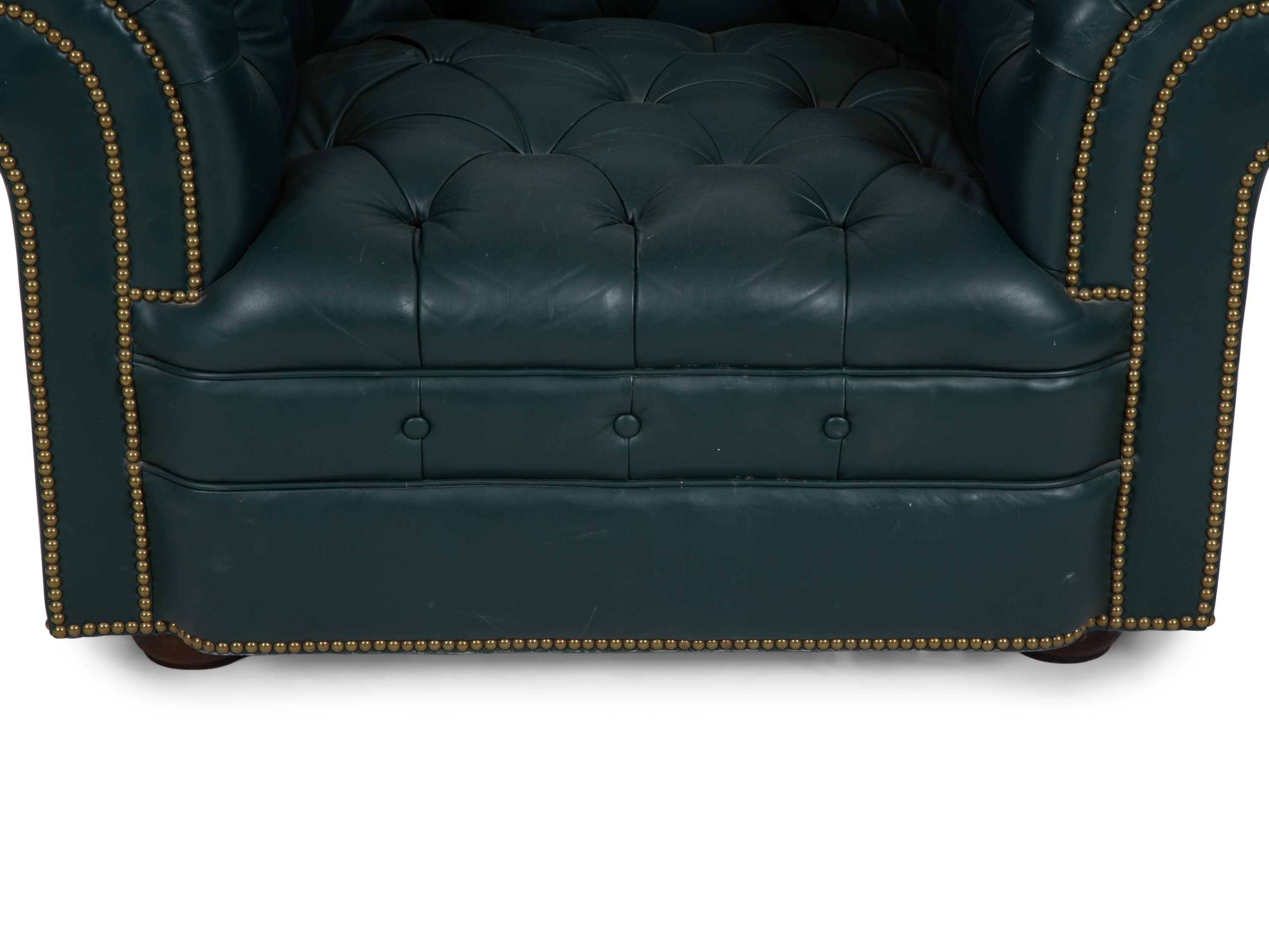 A Chesterfield Style Button-Tufted Leather Armchair