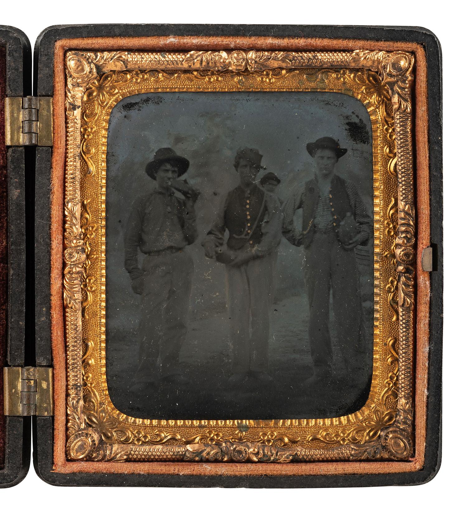 [CIVIL WAR]. Sixth plate outdoor tintype featuring a trio of Union pards showing off their canteens.