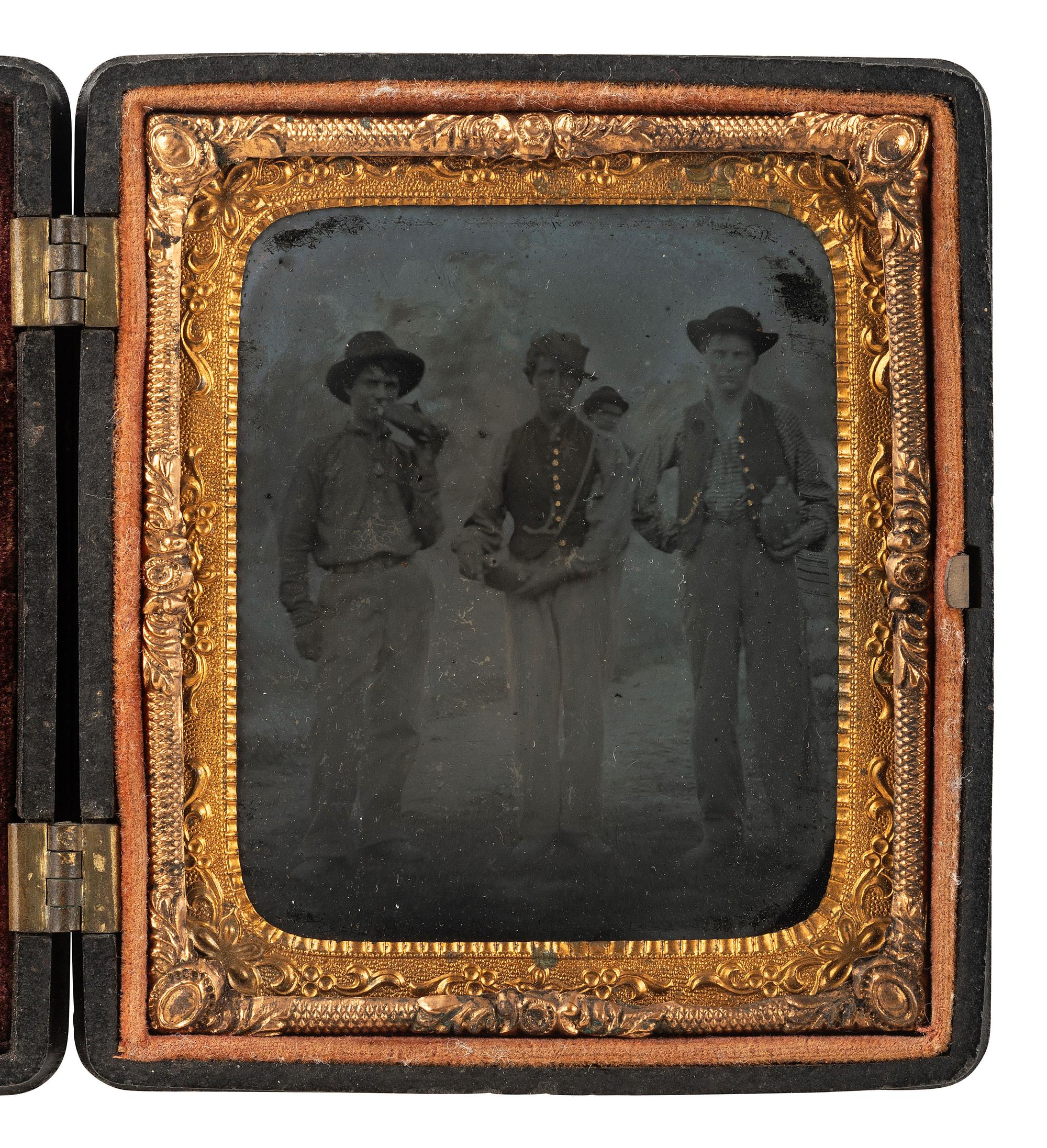 [CIVIL WAR]. Sixth plate outdoor tintype featuring a trio of Union pards showing off their canteens.