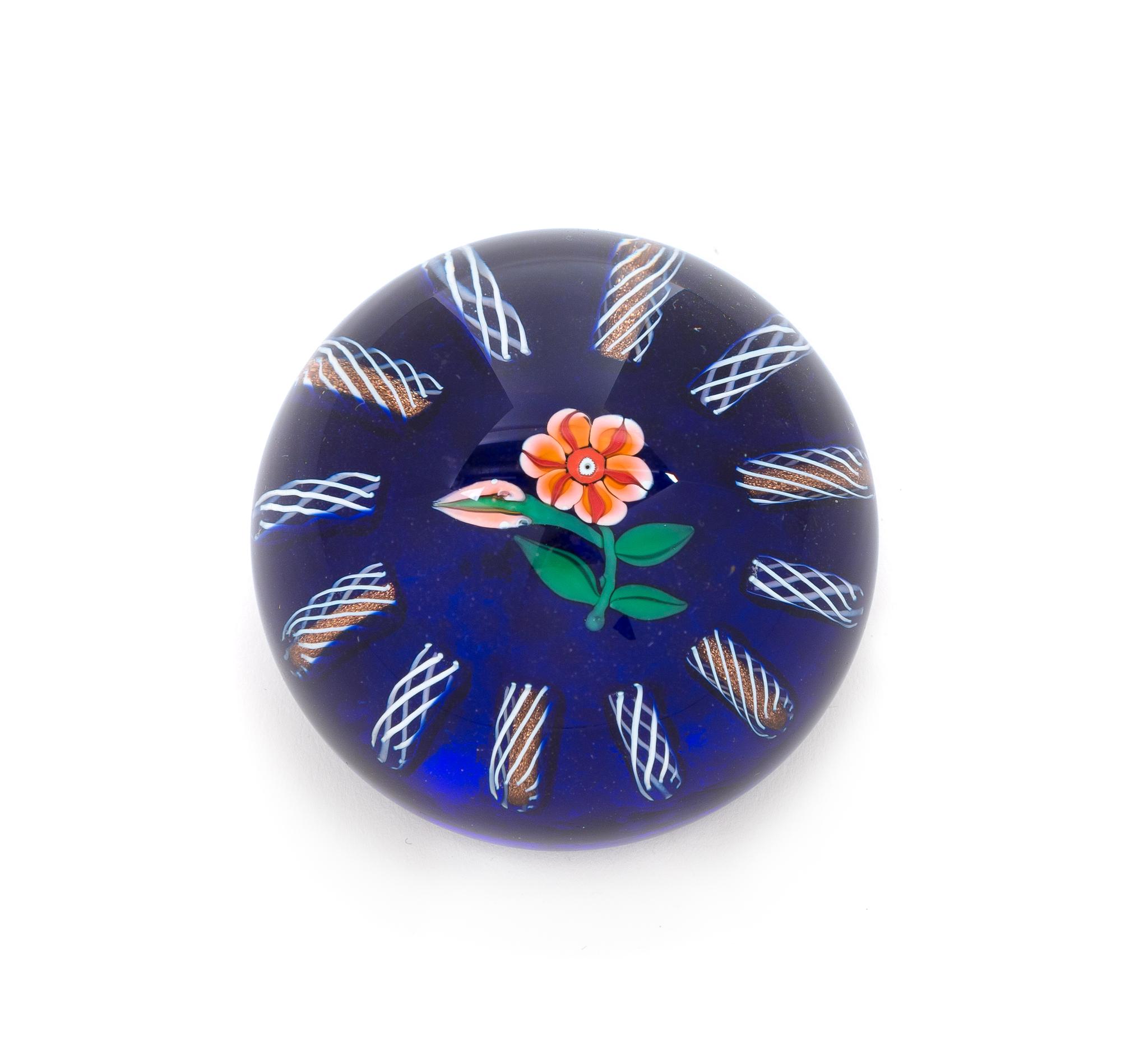 Paul Ysart, (Spanish, 1904-1991), a translucent blue-ground flower paperweight