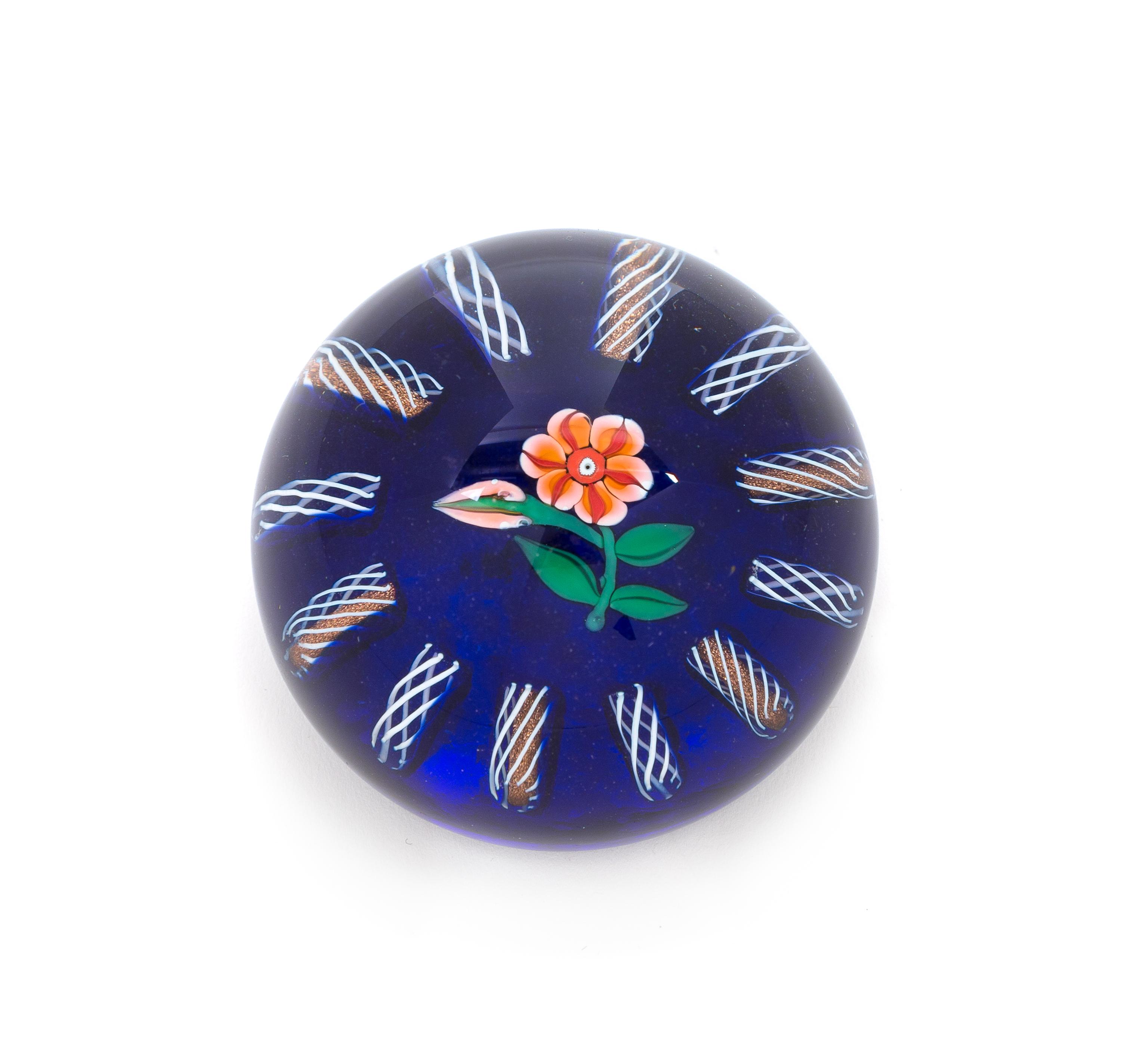 Paul Ysart, (Spanish, 1904-1991), a translucent blue-ground flower paperweight