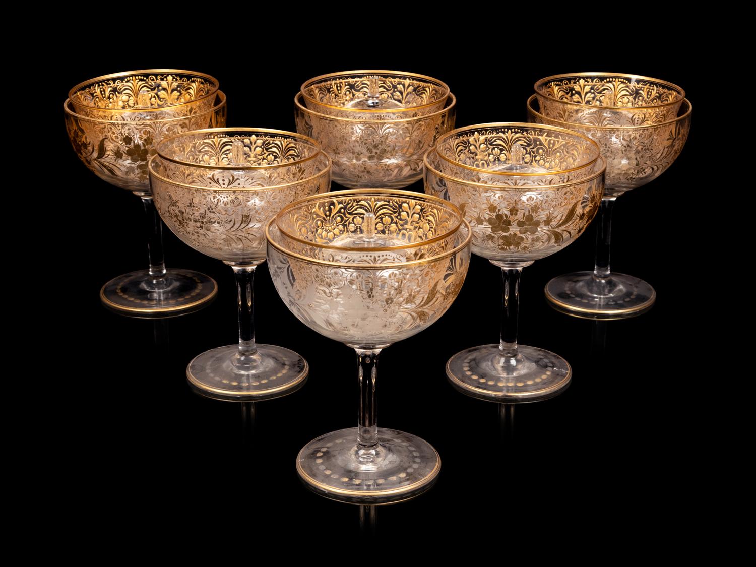 A Set of Twelve Gilt Decorated Glass Sorbets