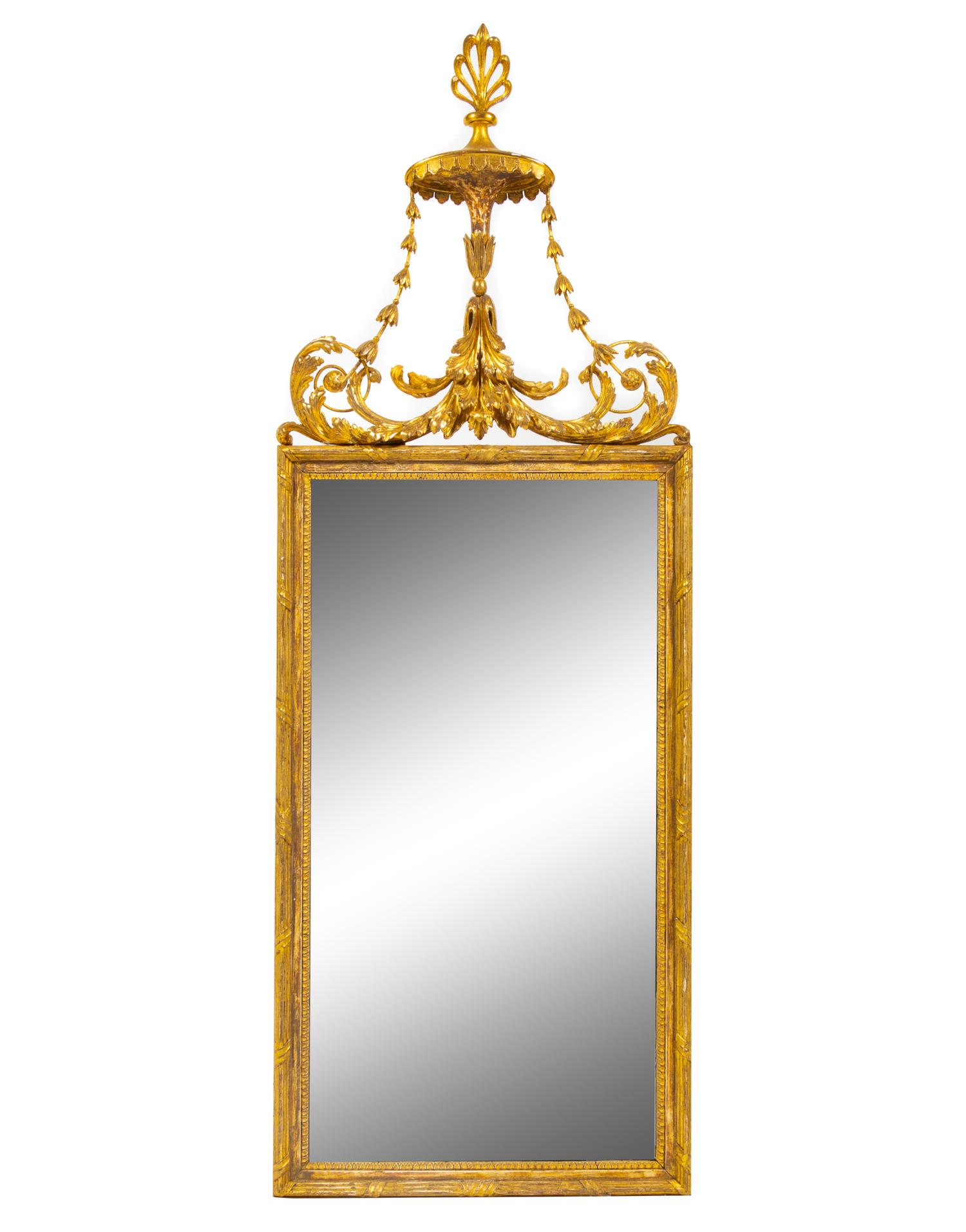 A George III Carved Giltwood Mirror